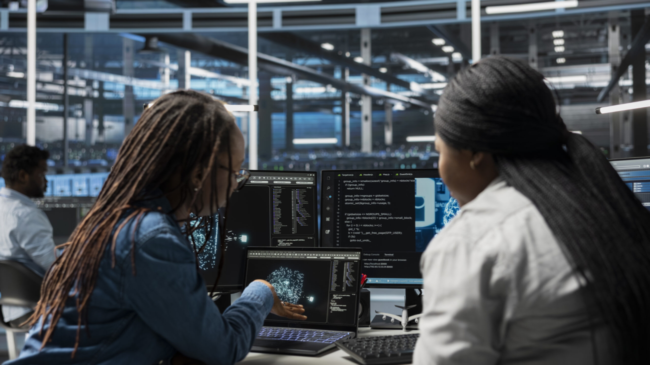 Data center admins using AI visualization tools to setup machine learning systems handling information. Experts using data analytics graphs to train neural networks to improve server farm operations
