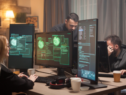 Female hacker with her team of cyber terrorists making a dangerous virus to attack the government.